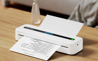 An A4 portable printer on the desk