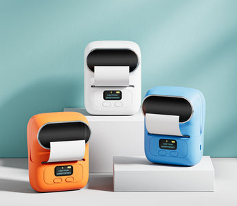 Three colorful handheld label maker