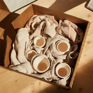 Pack safely the pottery products for shipment