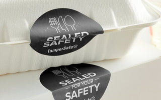 Sustainable food packaging with thermal label printed by inkless thermal label maker to seal.