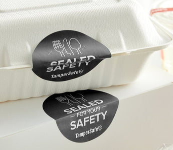 Sustainable food packaging with thermal label printed by inkless thermal label maker to seal.